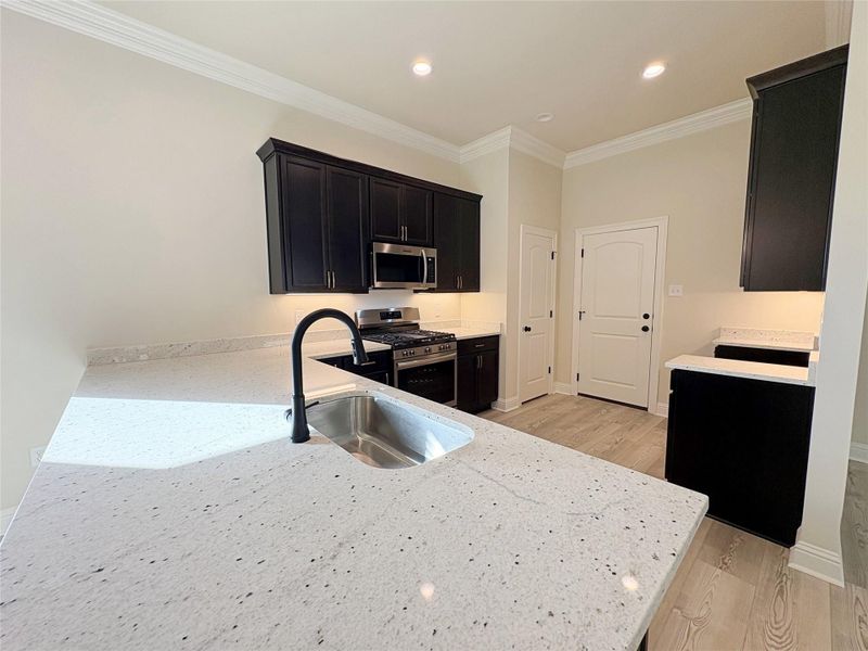 Furnished interior view inside a new home in Orange Gardens, Orange (Image 4).