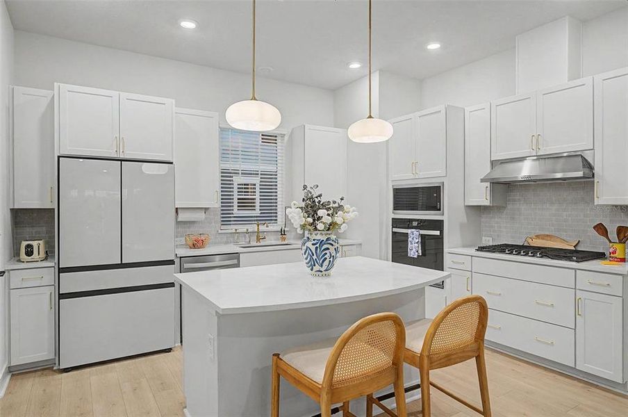 Furnished interior view inside a new home in Apex at Seminole Heights, Tampa (Image 9).