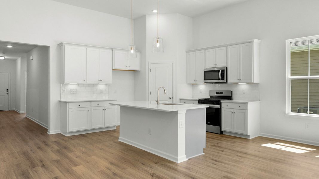 Furnished interior view inside a new home in Bluffs at Sun Colony, Longs (Image 10).