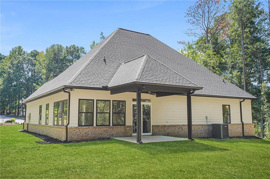 Front exterior of a new home in , Snellville, GA, highlighting curb appeal (Image 23).