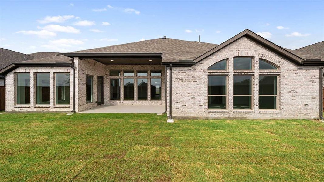 Exterior details and patio area of a home in Myrtle Creek 71', Waxahachie (Image 2).