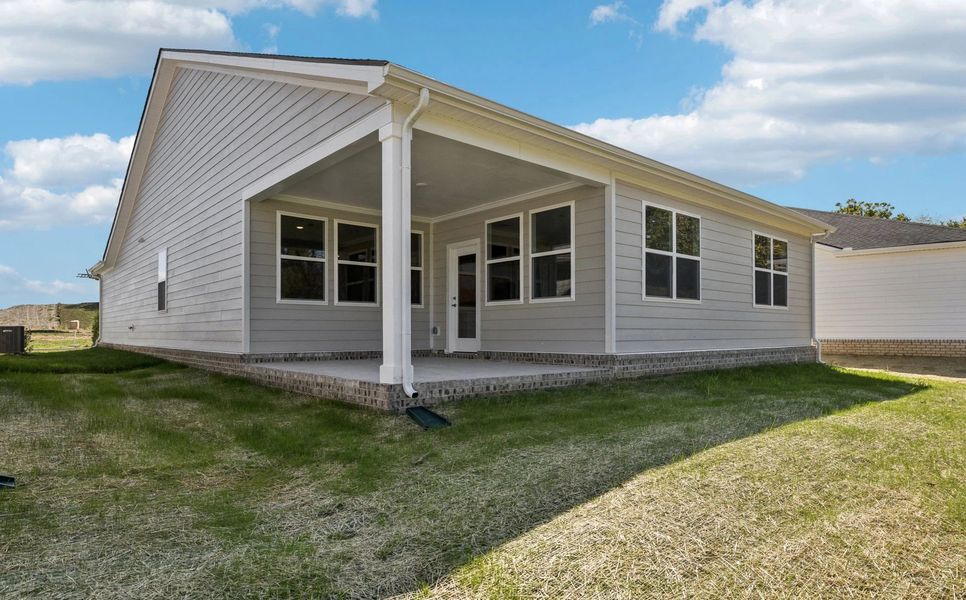 Exterior details and patio area of a home in Cedars at Cane Ridge | 55+ Community, Antioch (Image 3).