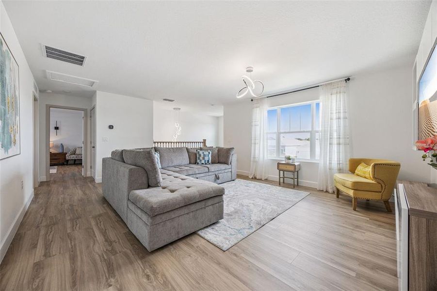 Furnished interior view inside a new home in Waterbrooke, Clermont (Image 28).