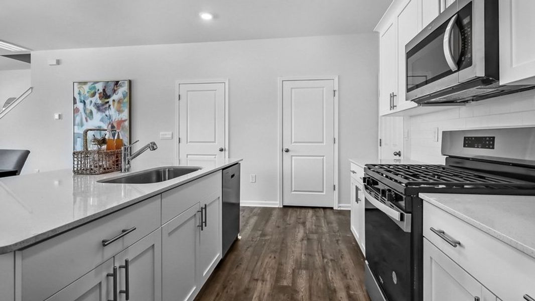 Representative furnished interior of a home built from the Collin by D.R. Horton in The Townes at Anderson Farm, Wendell (Image 6).