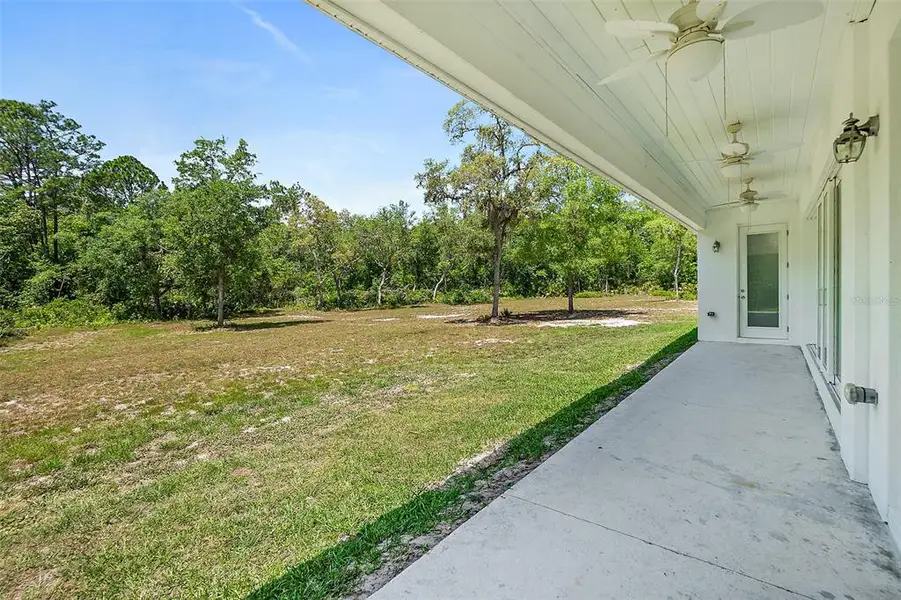 Exterior details and patio area of a home in , Pierson (Image 18).