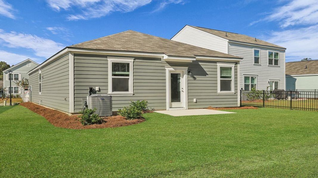 Exterior details and patio area of a home in The Oaks at Center Station, Hollywood (Image 22). Exterior details and patio area of a home in The Oaks at Center Station, Hollywood (Image 22).
