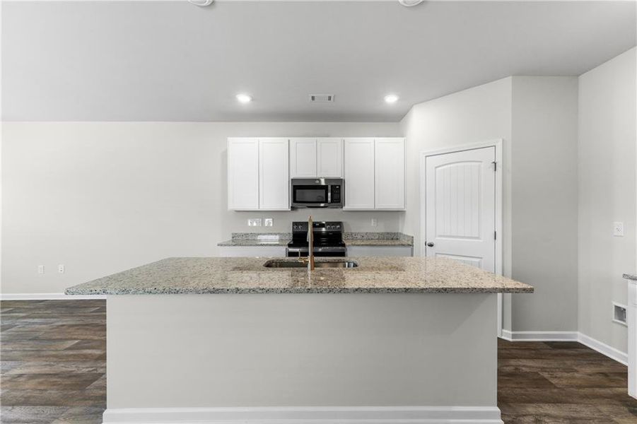Furnished interior view inside a new home in The Grove At Mundy Mill, Gainesville (Image 4).
