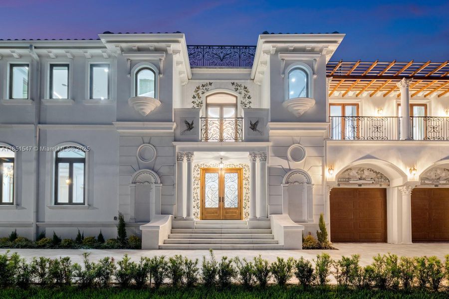 Front exterior of a new home in , Surfside, FL, highlighting curb appeal (Image 2).