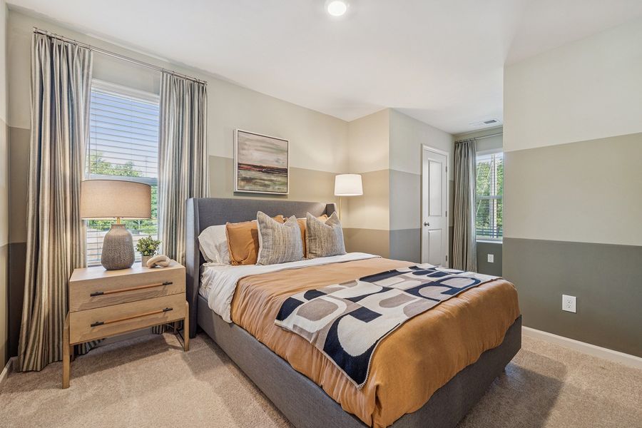 Representative furnished interior of a home built from the Cannalily - Genesis Value Collection by Mungo Homes in Lakeview Village, Charlotte (Image 8).