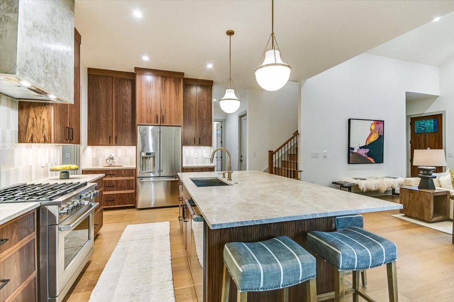 Another shot of the stunning kitchen! Corner island seating, which is so nice for casual dining & conversation! Another shot of the stunning kitchen! Corner island seating, which is so nice for casual dining & conversation!