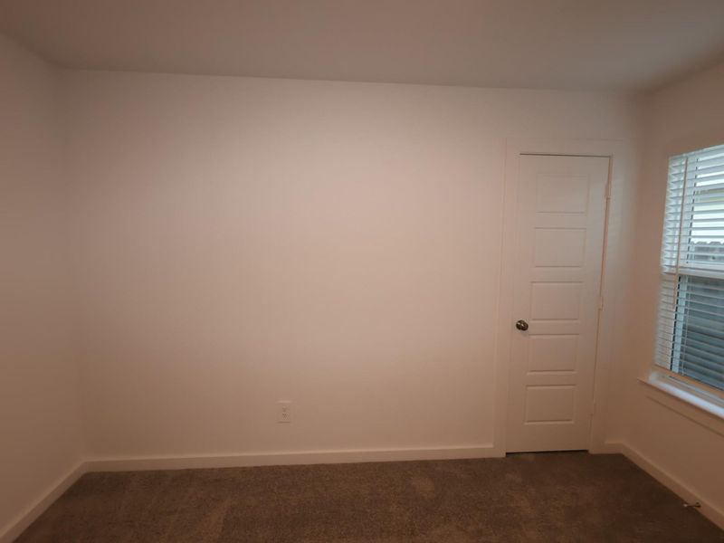 Spacious, unfurnished interior of a new home in Pinewood at Grand Texas, New Caney (Image 9).