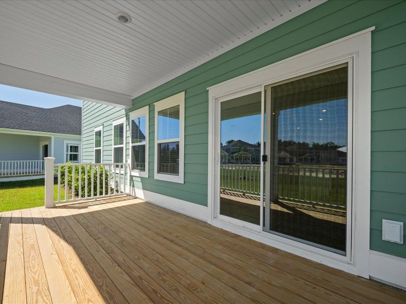 Exterior details and patio area of a home in The Coves at Lakes of Cane Bay, Summerville (Image 2). Exterior details and patio area of a home in The Coves at Lakes of Cane Bay, Summerville (Image 2).