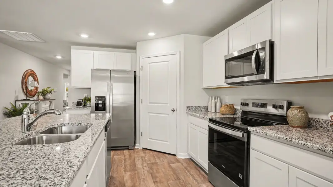 Furnished interior view inside a new home in Evington Place, Longs (Image 6).