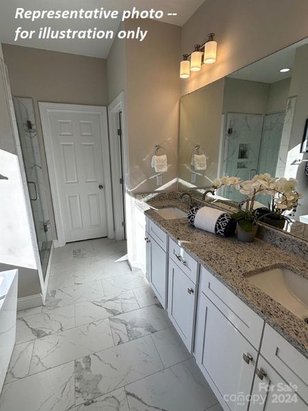 Tile and quartz counters in both bathrooms