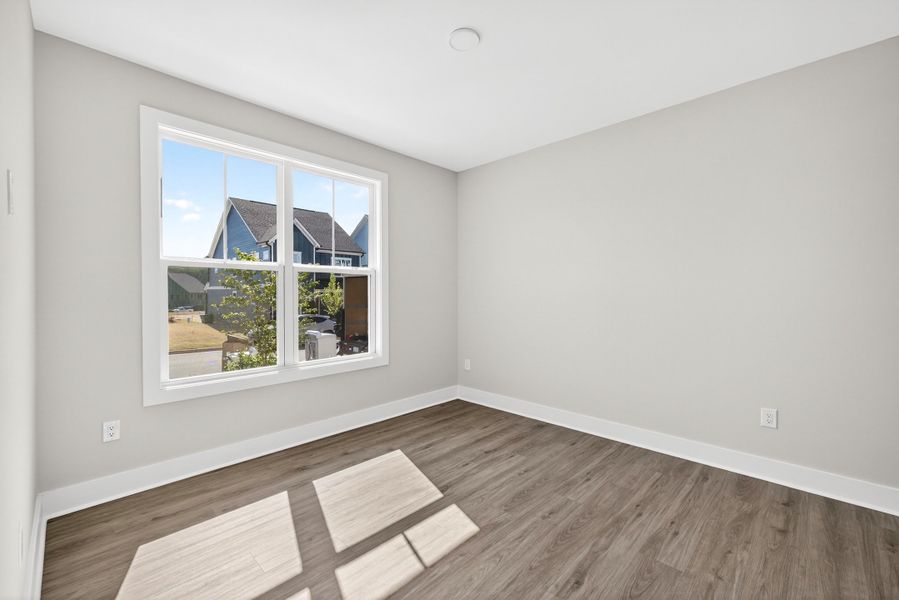 Representative unfurnished interior of a home built from the Atlas Interior Unit by Baker Residential in Atwater Station - Midtown Collection, Fuquay Varina (Image 47).