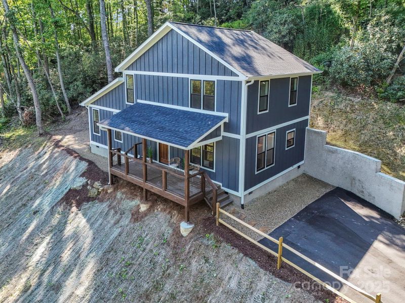 Aerial view of front and driveway