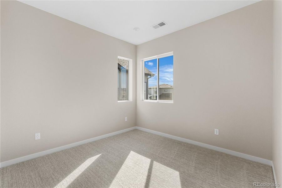 Spacious, unfurnished interior of a new home in Portrait at The Canyons, Castle Pines (Image 31).