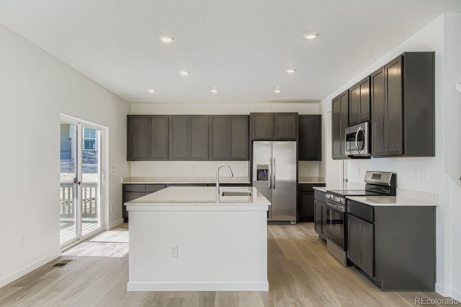 Furnished interior view inside a new home in Ken-Caryl Ranch: The Pioneer Collection, Littleton (Image 5).