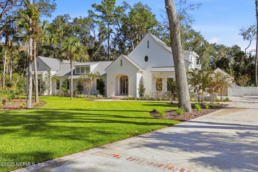 Front exterior of a new home in , Ponte Vedra, FL, highlighting curb appeal (Image 28).