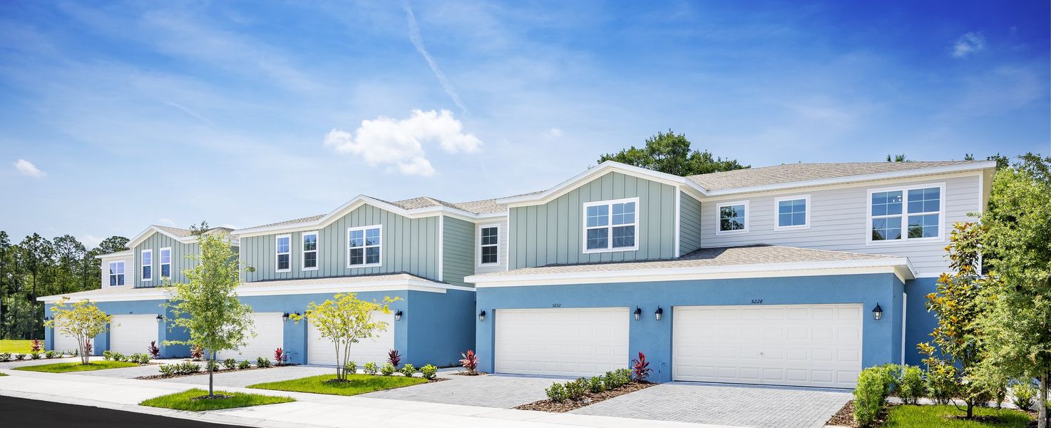 Representative exterior photo of a completed home built from the Elm by Hartizen Homes in Terra Haven, St. Cloud, FL (Image 22).