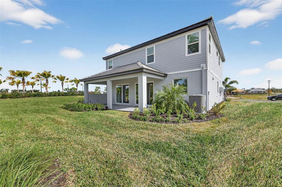 Exterior details and patio area of a home in Hawkstone, Sarasota (Image 3).