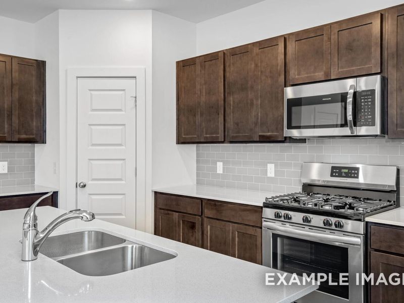 Representative furnished interior of a home built from the The Logan C by Davidson Homes LLC in Sage Farms, White House (Image 12).