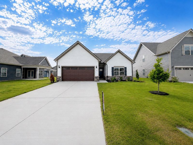 Front exterior of a new home in Salem Landing, Rockvale, TN, highlighting curb appeal (Image 1). Front exterior of a new home in Salem Landing, Rockvale, TN, highlighting curb appeal (Image 1).