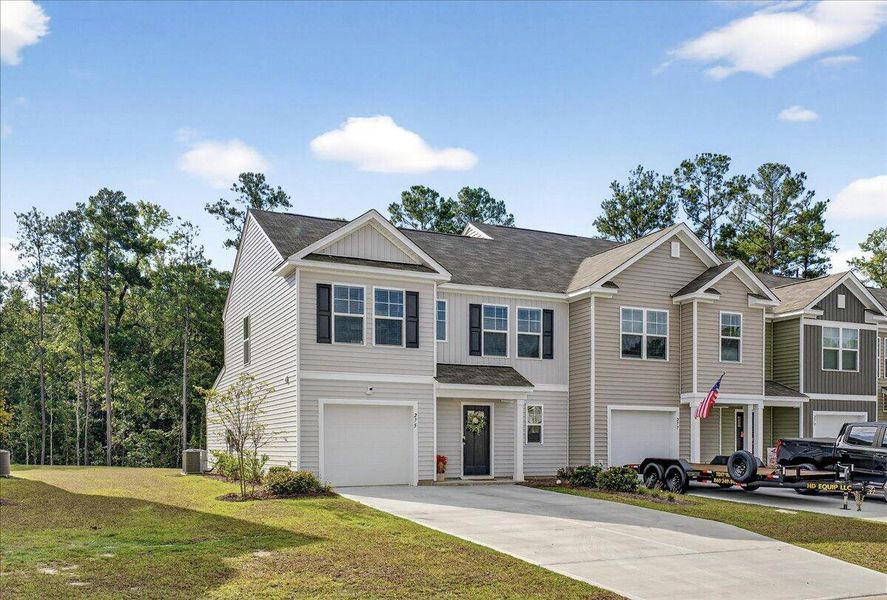 Front exterior of a new home in , Summerville, SC, highlighting curb appeal (Image 23).