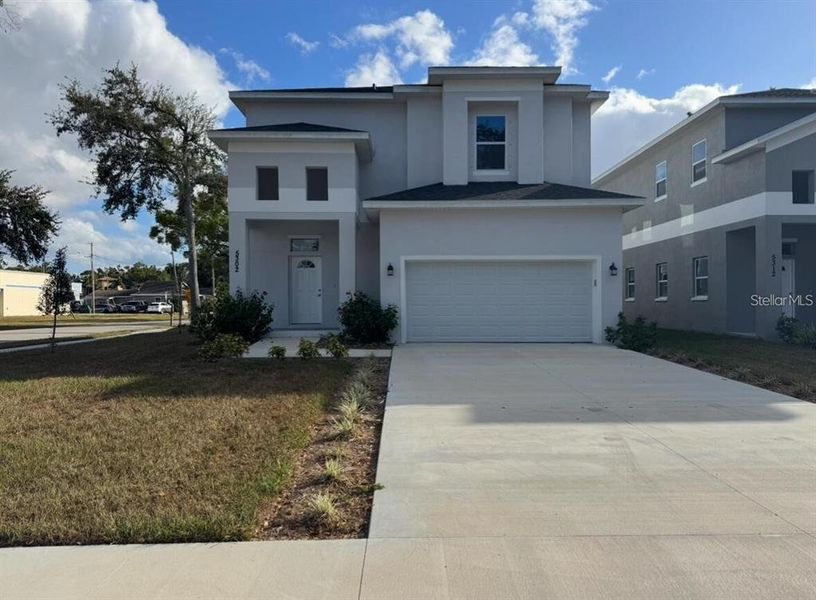 Front exterior of a new home in , Pinellas Park, FL, highlighting curb appeal (Image 1). Front exterior of a new home in , Pinellas Park, FL, highlighting curb appeal (Image 1).