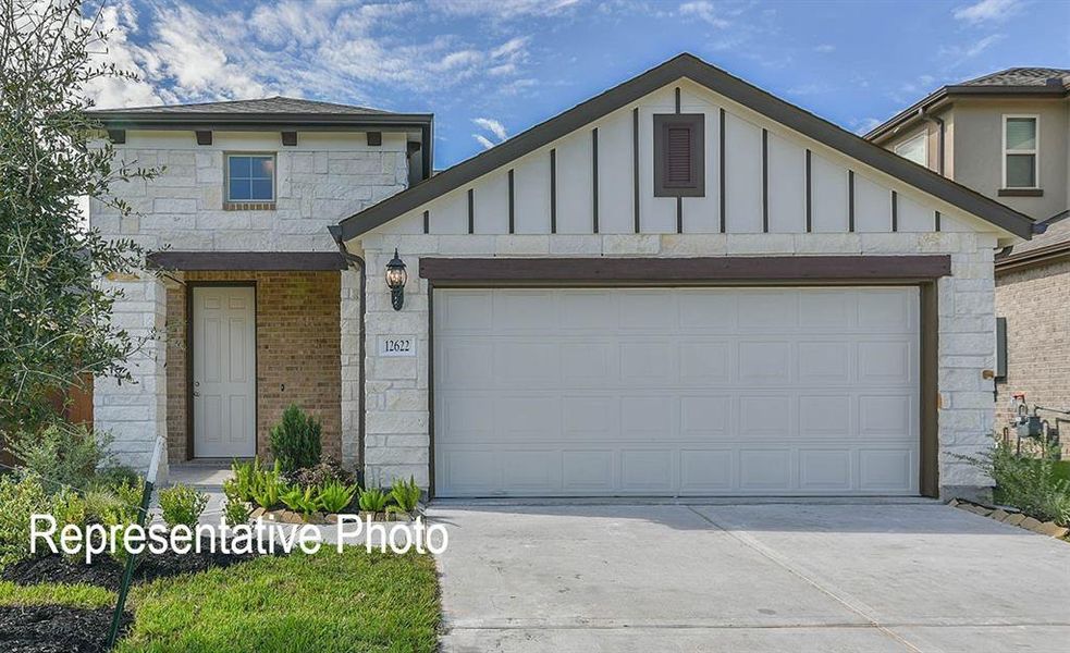 View of front of home with a garage