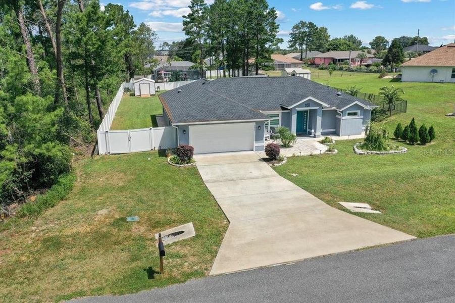 Front exterior of a new home in , Ocala, FL, highlighting curb appeal (Image 24). Front exterior of a new home in , Ocala, FL, highlighting curb appeal (Image 24).