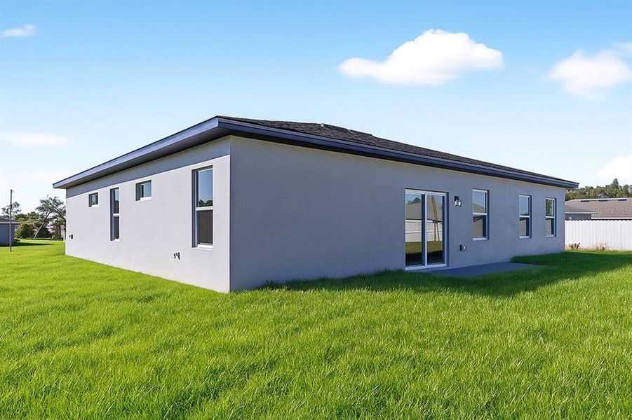 Exterior details and patio area of a home in , Ocala (Image 4).