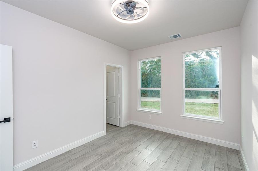 Bedroom featuring light wood-type flooring