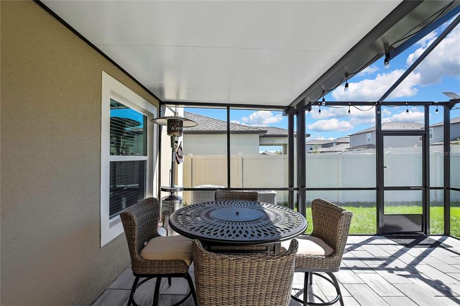 Exterior details and patio area of a home in Angeline: The Estates, Land O' Lakes (Image 3).