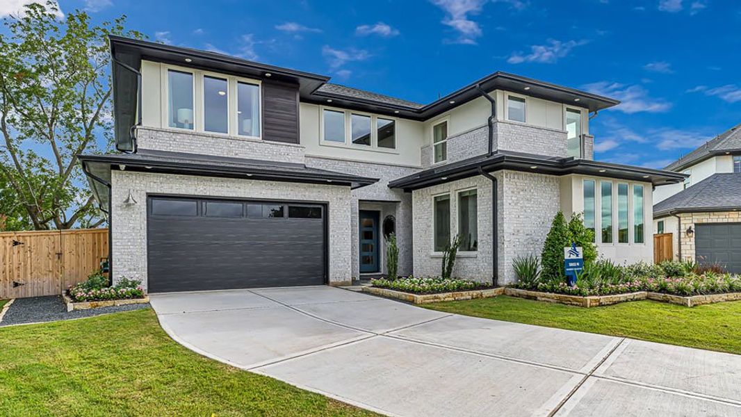 Representative exterior photo of a completed home built from the Valor by Taylor Morrison in Avalon at Cypress 60s, Cypress, TX (Image 20). Representative exterior photo of a completed home built from the Valor by Taylor Morrison in Avalon at Cypress 60s, Cypress, TX (Image 20).