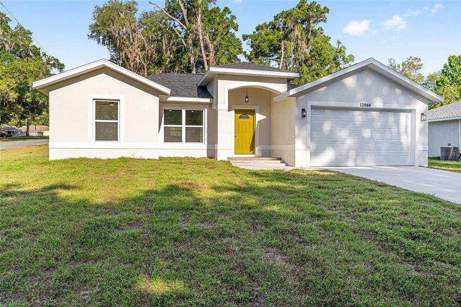 Front exterior of a new home in , Summerfield, FL, highlighting curb appeal (Image 16). Front exterior of a new home in , Summerfield, FL, highlighting curb appeal (Image 16).