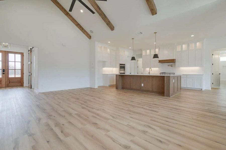 Representative unfurnished interior of a home built from the The Luke by Elmwood Custom Homes in Ranch at Stone Hill, Waxahachie (Image 42).