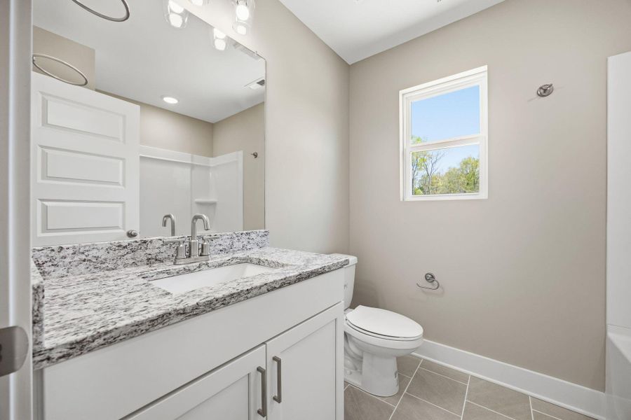 Bright and Modern Secondary Bathroom at Givens Park
