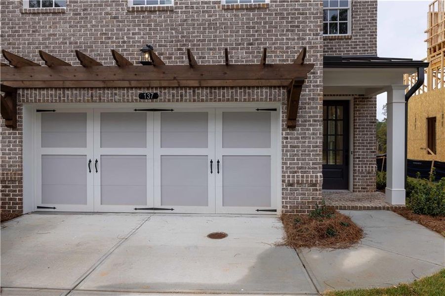Exterior details and patio area of a home in Waterside Townhomes, Peachtree Corners (Image 25). Exterior details and patio area of a home in Waterside Townhomes, Peachtree Corners (Image 25).