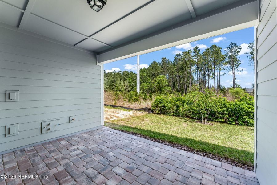 Exterior details and patio area of a home in Del Webb Wildlight, Yulee (Image 30).