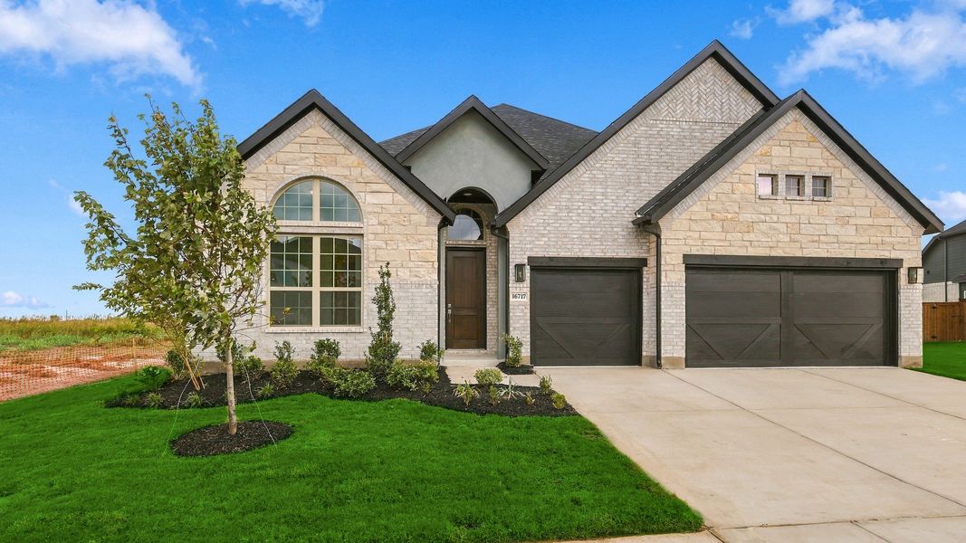 Front exterior of a new home in Green Meadows Classic, Celina, TX, highlighting curb appeal (Image 21).