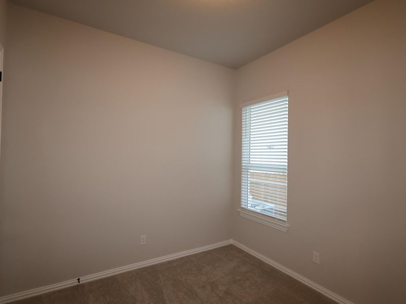 Spacious, unfurnished interior of a new home in Heritage, Dripping Springs (Image 11).