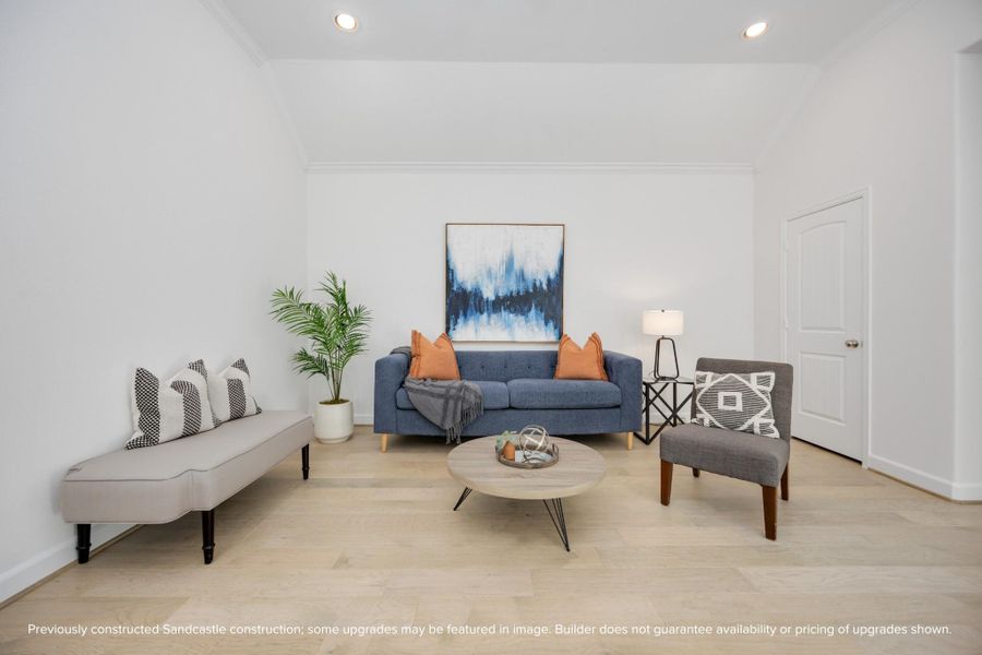 Crisp lines, curated color pops, and soft natural light make this upstairs living area feel like a boutique hotel lounge—right in your own home. Crisp lines, curated color pops, and soft natural light make this upstairs living area feel like a boutique hotel lounge—right in your own home.