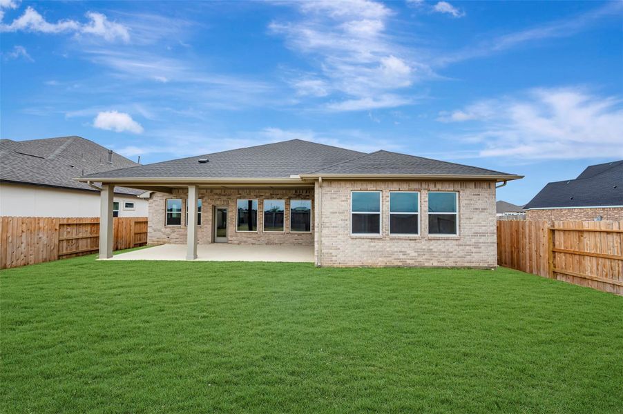 Exterior details and patio area of a home in The Grand Prairie 50’, Hockley (Image 4).