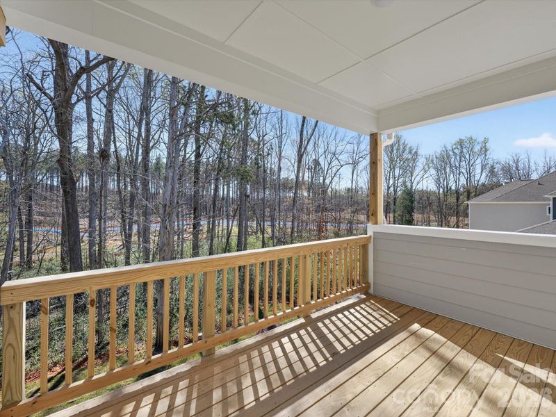 Exterior details and patio area of a home in North Creek Village, Huntersville (Image 3).