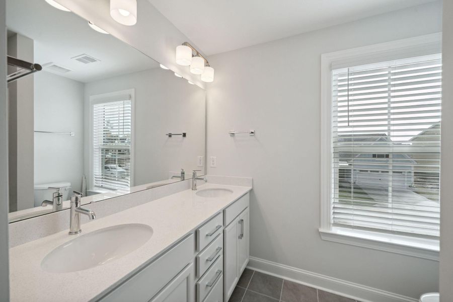Furnished interior view inside a new home in Tidewater at Lakes of Cane Bay, Summerville (Image 4).