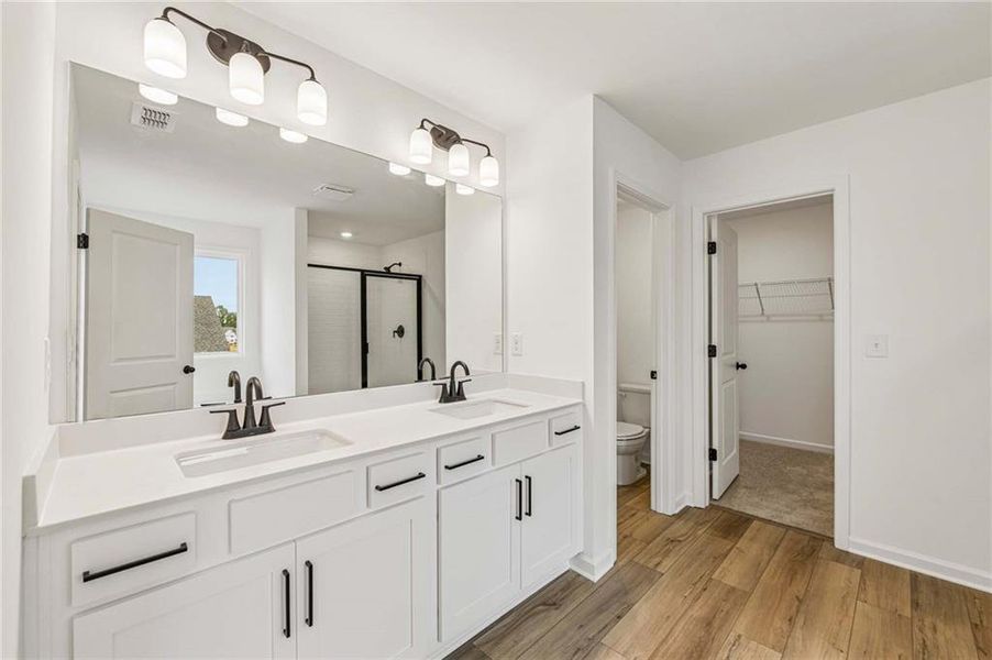 Furnished interior view inside a new home in Eastlyn Crossing, Flowery Branch (Image 12).