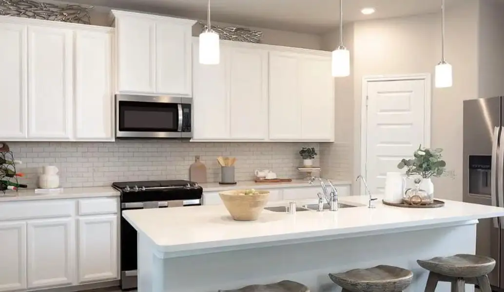 Photo is not of the actual home, but is an inspirational photo of builder’s model home and may depict options, furnishings, and/or decorator features that are not included