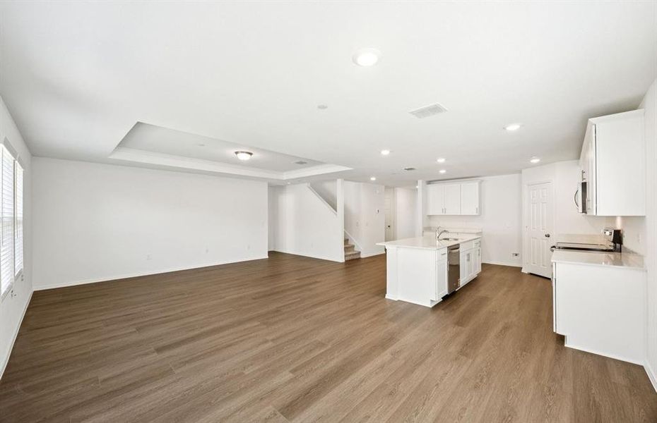 Open concept gathering room creating a spacious and inviting atmosphere Open concept gathering room creating a spacious and inviting atmosphere