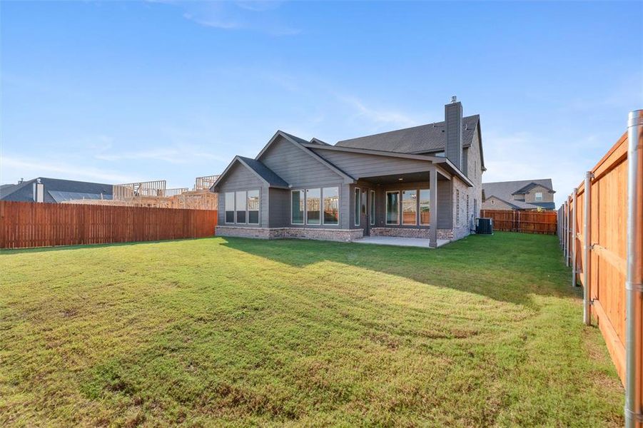 Exterior details and patio area of a home in Northstar, Haslet (Image 19).